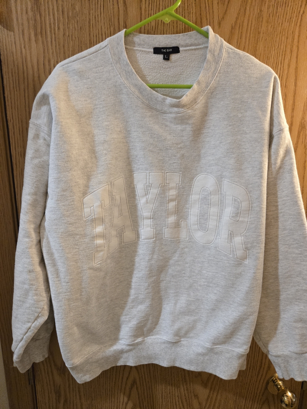 The Bar Crewneck Sweatshirt in Light Gray with Embossed TAYLOR